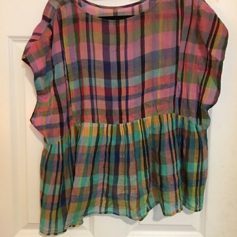 Multi-plaid peplum top